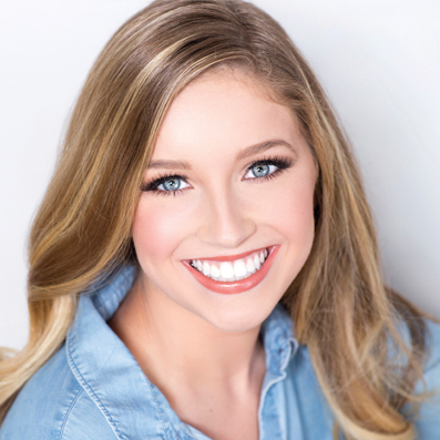 Blonde haired girl with denim shirt