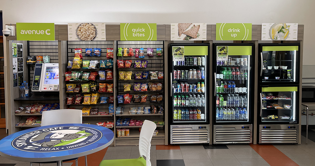 Four vending machines and kiosk for self serve cafeteria food