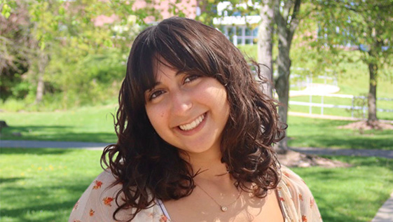 Female student outside on campus.