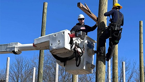 Lineworkers on a pole