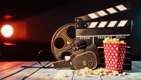 Popcorn, film, and clapboard.
